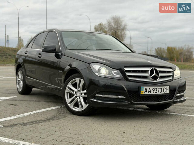 Черный Мерседес Ц-Класс, объемом двигателя 1.8 л и пробегом 147 тыс. км за 11950 $, фото 1 на Automoto.ua