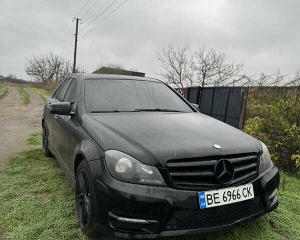 Черный Мерседес Ц-Класс, объемом двигателя 1.8 л и пробегом 170 тыс. км за 11500 $, фото 1 на Automoto.ua