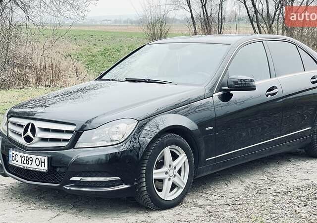 Черный Мерседес Ц-Класс, объемом двигателя 1.8 л и пробегом 202 тыс. км за 13500 $, фото 1 на Automoto.ua