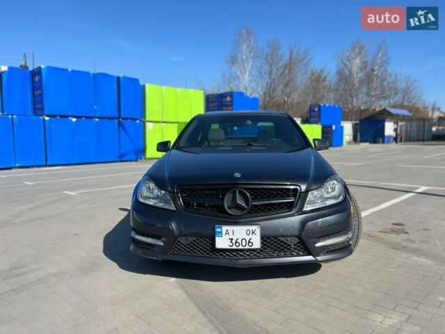 Чорний Мерседес Ц-Клас, об'ємом двигуна 1.8 л та пробігом 245 тис. км за 11300 $, фото 1 на Automoto.ua