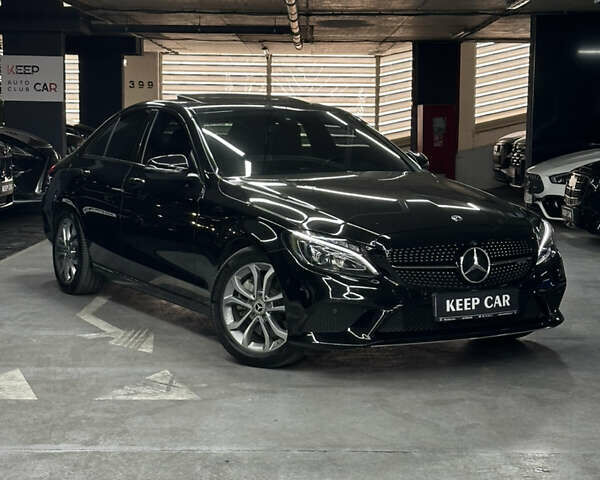 Черный Мерседес Ц-Класс, объемом двигателя 2 л и пробегом 126 тыс. км за 21999 $, фото 1 на Automoto.ua