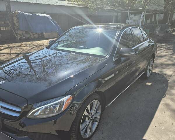 Черный Мерседес Ц-Класс, объемом двигателя 1.99 л и пробегом 112 тыс. км за 24000 $, фото 1 на Automoto.ua