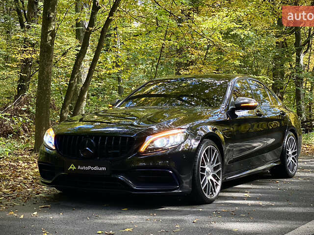 Черный Мерседес Ц-Класс, объемом двигателя 3.98 л и пробегом 63 тыс. км за 46990 $, фото 1 на Automoto.ua