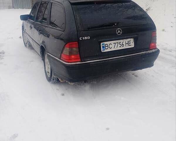 Чорний Мерседес Ц-Клас, об'ємом двигуна 1.8 л та пробігом 365 тис. км за 2099 $, фото 1 на Automoto.ua
