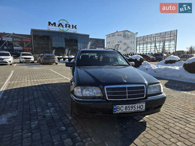 Черный Мерседес Ц-Класс, объемом двигателя 2 л и пробегом 460 тыс. км за 2900 $, фото 1 на Automoto.ua