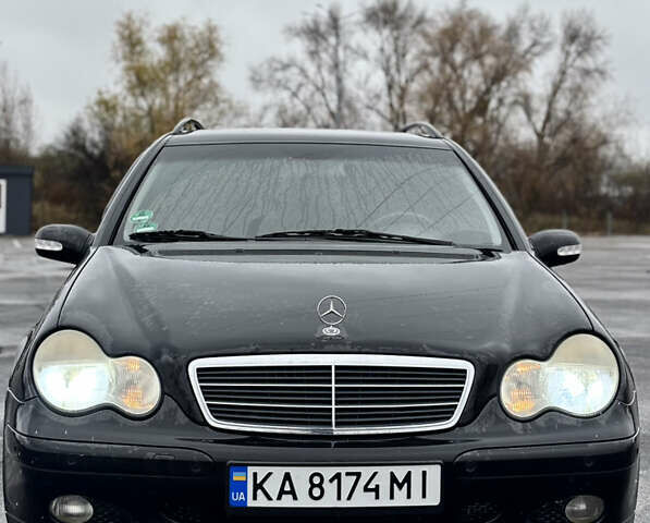 Черный Мерседес Ц-Класс, объемом двигателя 1.8 л и пробегом 165 тыс. км за 3999 $, фото 1 на Automoto.ua