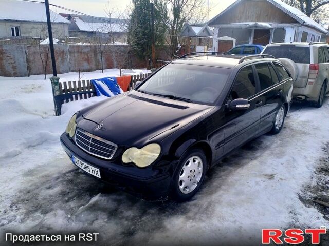 Черный Мерседес Ц-Класс, объемом двигателя 2.1 л и пробегом 300 тыс. км за 4000 $, фото 1 на Automoto.ua