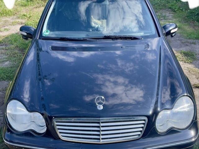 Чорний Мерседес Ц-Клас, об'ємом двигуна 1.8 л та пробігом 213 тис. км за 1918 $, фото 1 на Automoto.ua