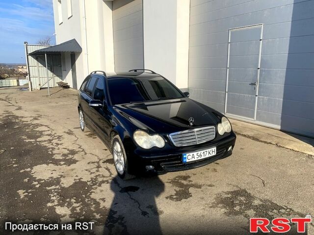 Черный Мерседес Ц-Класс, объемом двигателя 1.8 л и пробегом 350 тыс. км за 5000 $, фото 1 на Automoto.ua