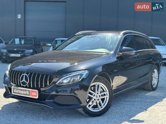 Черный Мерседес Ц-Класс, объемом двигателя 2.2 л и пробегом 156 тыс. км за 18290 $, фото 1 на Automoto.ua
