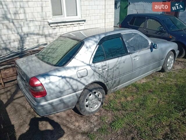 Сірий Мерседес Ц-Клас, об'ємом двигуна 2.3 л та пробігом 250 тис. км за 1000 $, фото 1 на Automoto.ua