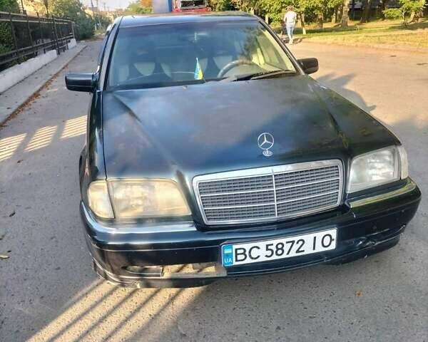 Синий Мерседес Ц-Класс, объемом двигателя 2.3 л и пробегом 319 тыс. км за 3000 $, фото 1 на Automoto.ua