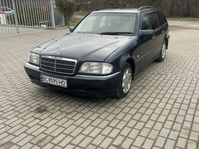 Синій Мерседес Ц-Клас, об'ємом двигуна 2 л та пробігом 460 тис. км за 3000 $, фото 1 на Automoto.ua