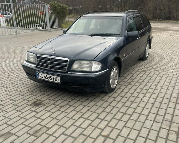 Синій Мерседес Ц-Клас, об'ємом двигуна 2 л та пробігом 460 тис. км за 3100 $, фото 1 на Automoto.ua