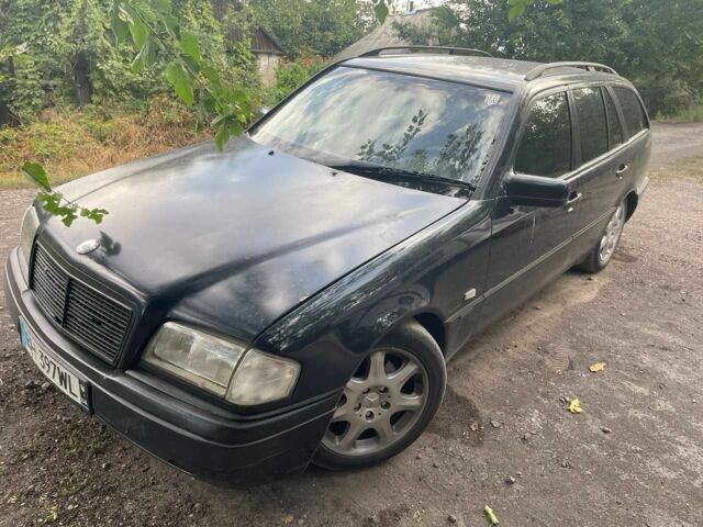 Синий Мерседес Ц-Класс, объемом двигателя 1.8 л и пробегом 270 тыс. км за 600 $, фото 1 на Automoto.ua