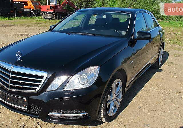 Чорний Мерседес E 200, об'ємом двигуна 2.2 л та пробігом 290 тис. км за 14500 $, фото 1 на Automoto.ua