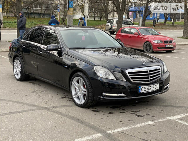 Чорний Мерседес E 200, об'ємом двигуна 2.1 л та пробігом 211 тис. км за 12000 $, фото 1 на Automoto.ua