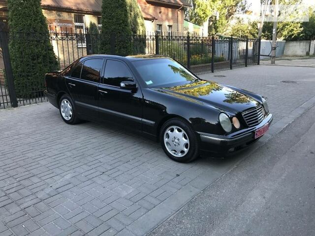 Чорний Мерседес E 200, об'ємом двигуна 2 л та пробігом 250 тис. км за 7500 $, фото 1 на Automoto.ua