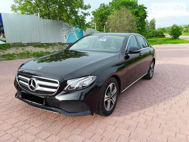 Чорний Мерседес E 220, об'ємом двигуна 2 л та пробігом 95 тис. км за 41000 $, фото 1 на Automoto.ua