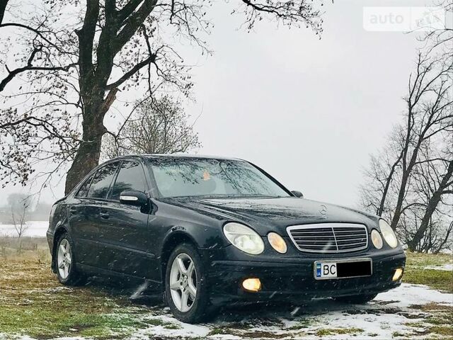 Чорний Мерседес E 220, об'ємом двигуна 2.2 л та пробігом 275 тис. км за 8700 $, фото 1 на Automoto.ua