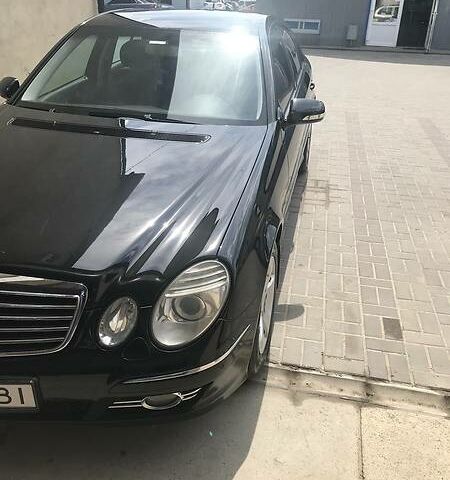 Чорний Мерседес E 220, об'ємом двигуна 2.2 л та пробігом 224 тис. км за 14500 $, фото 1 на Automoto.ua