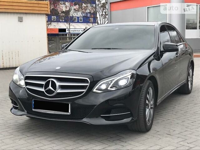 Чорний Мерседес E 220, об'ємом двигуна 2.2 л та пробігом 75 тис. км за 27800 $, фото 1 на Automoto.ua