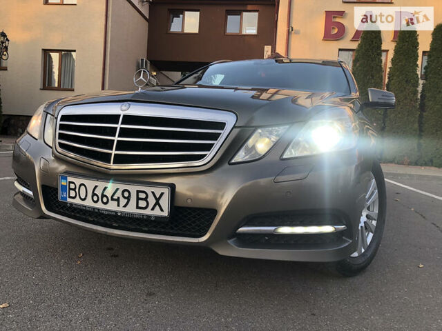 Сірий Мерседес E 220, об'ємом двигуна 2.2 л та пробігом 285 тис. км за 13300 $, фото 1 на Automoto.ua