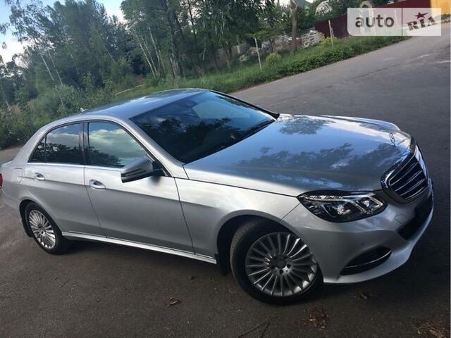 Сірий Мерседес E 220, об'ємом двигуна 2.2 л та пробігом 102 тис. км за 34222 $, фото 1 на Automoto.ua