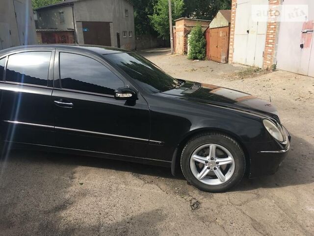 Чорний Мерседес E 240, об'ємом двигуна 2.6 л та пробігом 243 тис. км за 10800 $, фото 1 на Automoto.ua