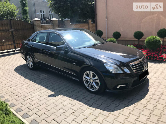 Чорний Мерседес E 250, об'ємом двигуна 2.2 л та пробігом 230 тис. км за 19900 $, фото 1 на Automoto.ua