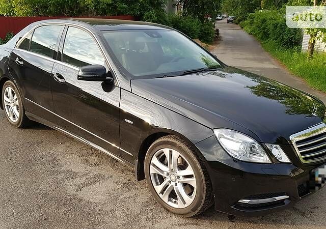 Чорний Мерседес E 250, об'ємом двигуна 2.2 л та пробігом 55 тис. км за 31500 $, фото 1 на Automoto.ua