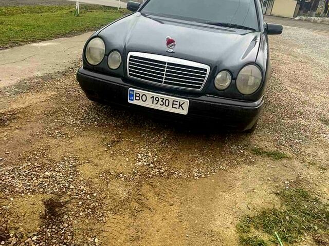 Черный Мерседес Е-Класс, объемом двигателя 2 л и пробегом 435 тыс. км за 2500 $, фото 1 на Automoto.ua