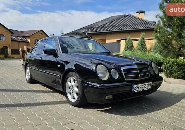 Черный Мерседес Е-Класс, объемом двигателя 2.3 л и пробегом 399 тыс. км за 5000 $, фото 1 на Automoto.ua
