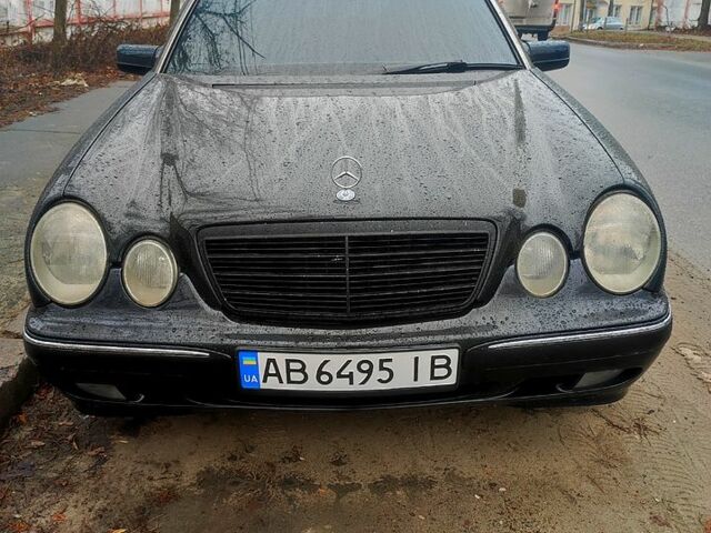 Черный Мерседес Е-Класс, объемом двигателя 2 л и пробегом 388 тыс. км за 2950 $, фото 1 на Automoto.ua