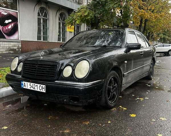 Черный Мерседес Е-Класс, объемом двигателя 2.8 л и пробегом 390 тыс. км за 2950 $, фото 1 на Automoto.ua