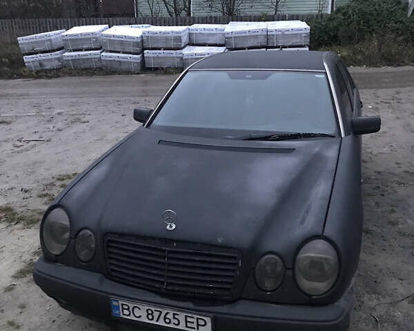 Чорний Мерседес Е-Клас, об'ємом двигуна 2 л та пробігом 419 тис. км за 2200 $, фото 1 на Automoto.ua