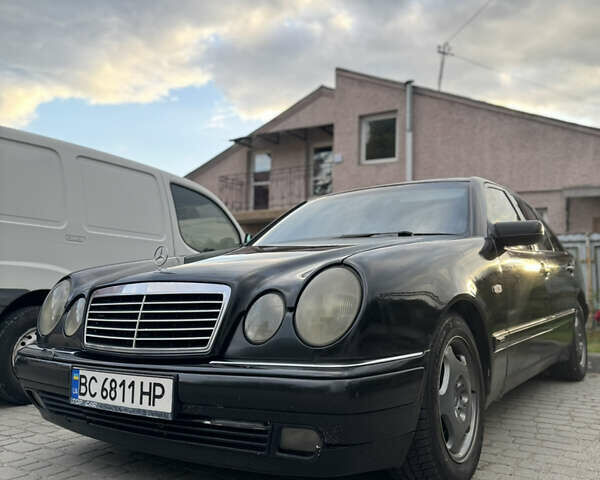 Черный Мерседес Е-Класс, объемом двигателя 2 л и пробегом 478 тыс. км за 3800 $, фото 1 на Automoto.ua