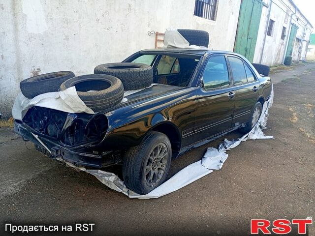 Черный Мерседес Е-Класс, объемом двигателя 2.8 л и пробегом 218 тыс. км за 2200 $, фото 1 на Automoto.ua