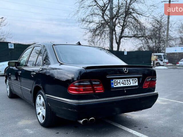 Черный Мерседес Е-Класс, объемом двигателя 4.27 л и пробегом 300 тыс. км за 3450 $, фото 1 на Automoto.ua