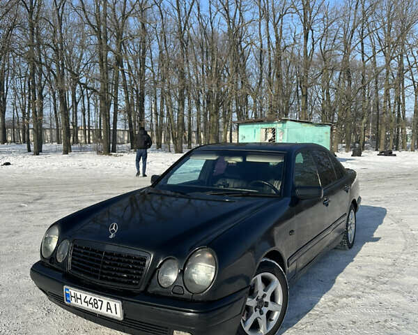 Чорний Мерседес Е-Клас, об'ємом двигуна 2.8 л та пробігом 376 тис. км за 2399 $, фото 1 на Automoto.ua
