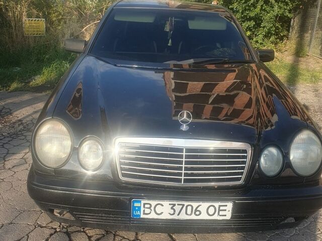 Чорний Мерседес Е-Клас, об'ємом двигуна 2 л та пробігом 222 тис. км за 1750 $, фото 1 на Automoto.ua