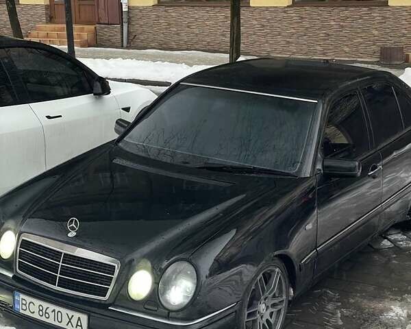 Черный Мерседес Е-Класс, объемом двигателя 2.8 л и пробегом 440 тыс. км за 3666 $, фото 1 на Automoto.ua