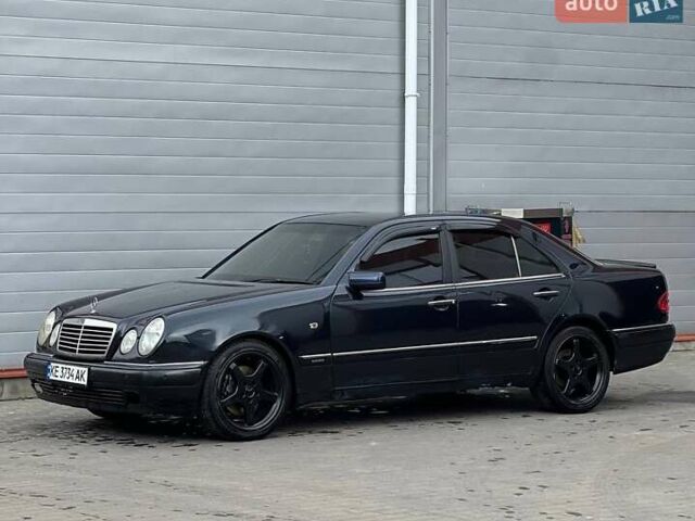 Черный Мерседес Е-Класс, объемом двигателя 4.3 л и пробегом 200 тыс. км за 3999 $, фото 1 на Automoto.ua