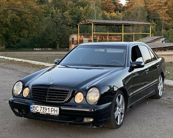 Черный Мерседес Е-Класс, объемом двигателя 2 л и пробегом 350 тыс. км за 2699 $, фото 1 на Automoto.ua