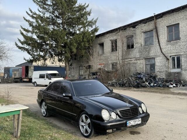 Черный Мерседес Е-Класс, объемом двигателя 2 л и пробегом 400 тыс. км за 2500 $, фото 1 на Automoto.ua