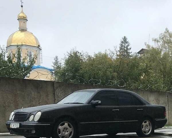 Чорний Мерседес Е-Клас, об'ємом двигуна 2 л та пробігом 403 тис. км за 4500 $, фото 1 на Automoto.ua