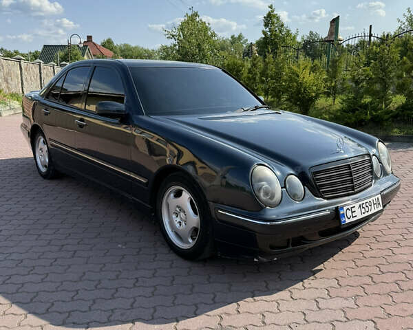 Черный Мерседес Е-Класс, объемом двигателя 2.8 л и пробегом 242 тыс. км за 3999 $, фото 1 на Automoto.ua