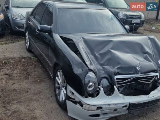Черный Мерседес Е-Класс, объемом двигателя 2 л и пробегом 300 тыс. км за 2800 $, фото 1 на Automoto.ua