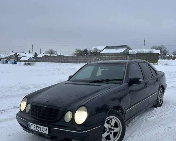 Чорний Мерседес Е-Клас, об'ємом двигуна 2 л та пробігом 340 тис. км за 2450 $, фото 1 на Automoto.ua