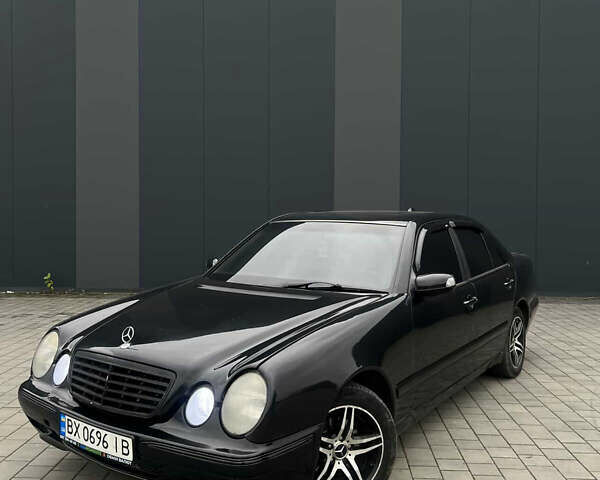 Черный Мерседес Е-Класс, объемом двигателя 2 л и пробегом 430 тыс. км за 3600 $, фото 1 на Automoto.ua